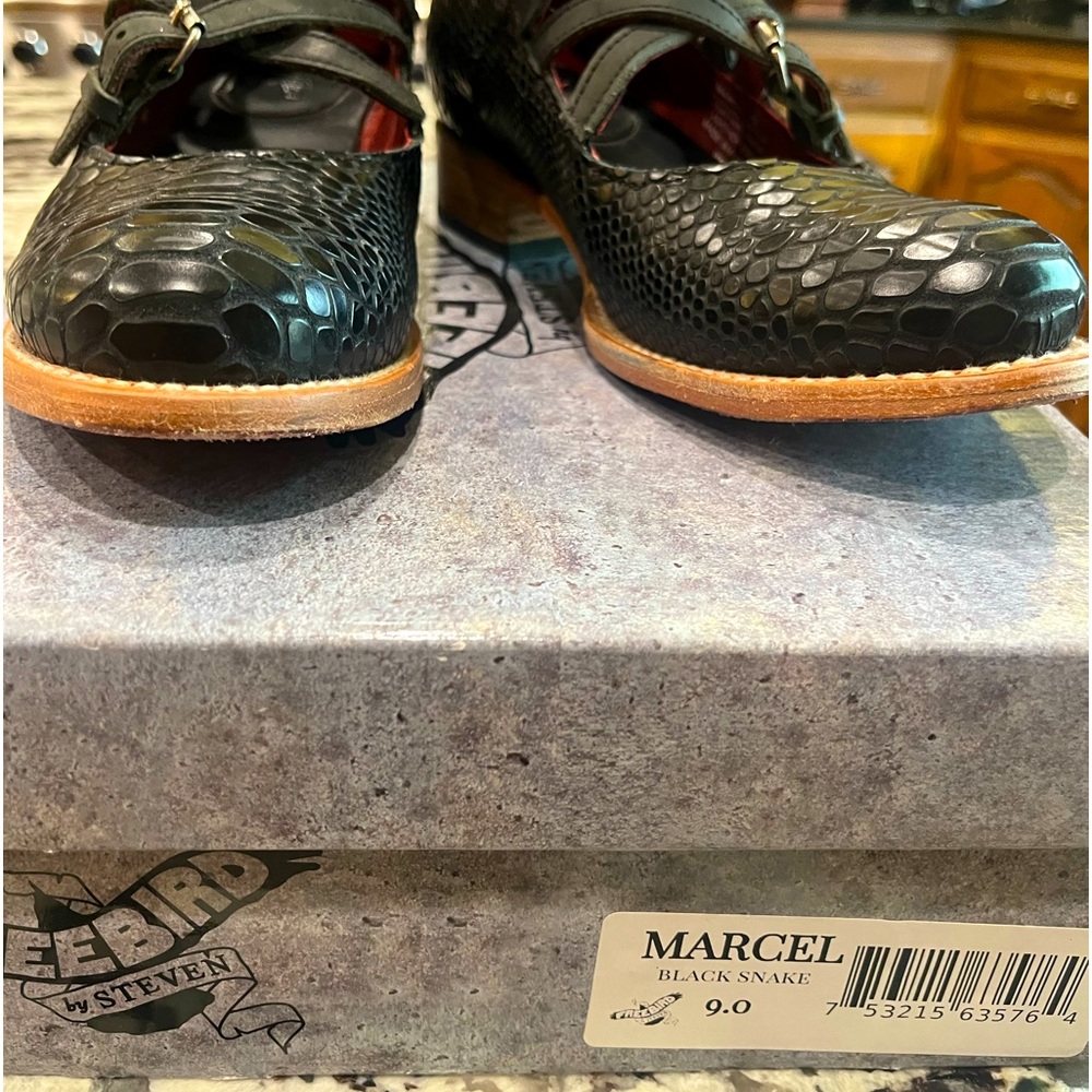 Freebird Marcel black snake print gently worn. Size 9.
